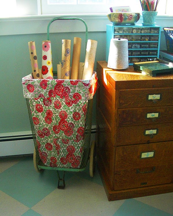 Vintage shopping cart - lined and used as wallpaper storage