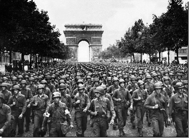 American soldiers march  Paris. August 24 1944