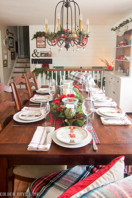 Farmhouse style dining room with shiplap and traditional holiday table setting