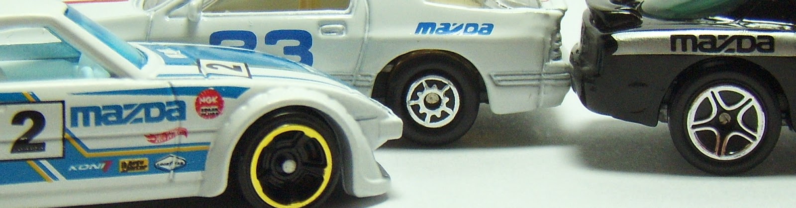 Hot Wheels 1979, Maisto 1986, and Matchbox 1993 Mazda RX7