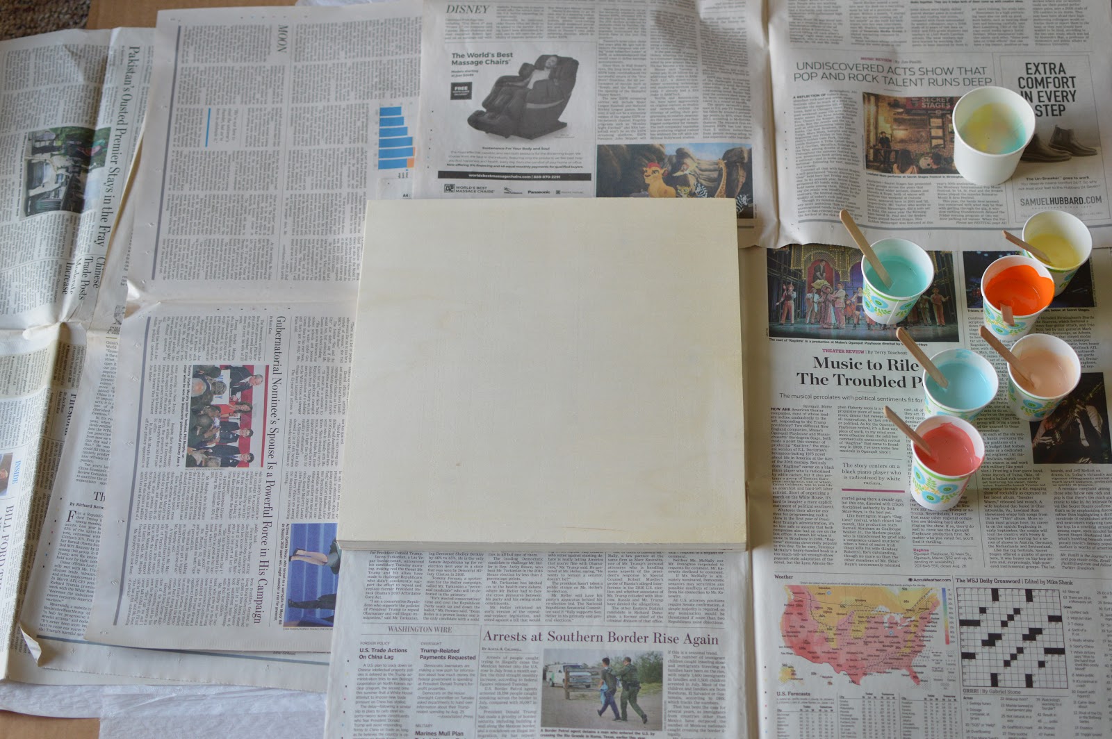 Vikalpah How to paint pour using acrylic paint and Mod Podge on wood panel