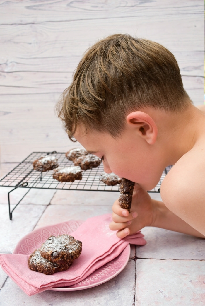 Child eating an Oaty Chocolate and Banana Cookie