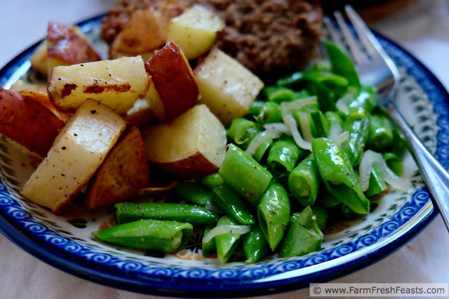 a plate of quick crispy sugar snap peas, roasted potatoes, and meatloaf
