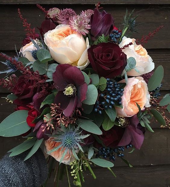 Rich burgundy, green and peach fall floral arrangement from Sarah Winward on Hello Lovely Studio. #fallfloral #fallbouquet #winterbouquet #florals #freshflorals