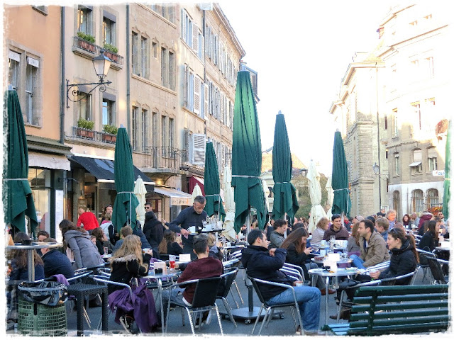 Outdoor cafés aren't just for summer – on the Place de Bourg de Four, Geneva, Switzerland.