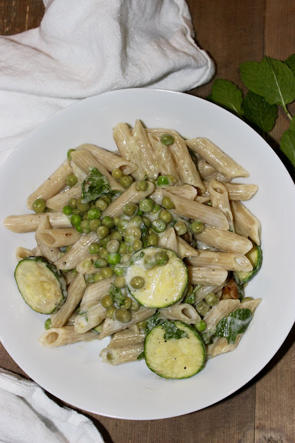 creamy pea mint and lemon pasta with courgette