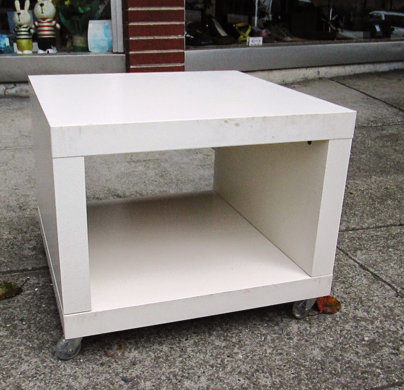 UHURU FURNITURE & COLLECTIBLES SOLD Small White Side Table On Rollers