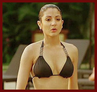 Anushka Sharma in a black bikini looking sad and desolate