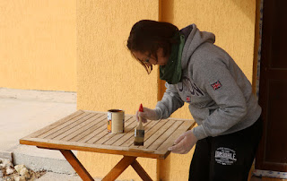 Staining up the patio furniture Staining up the patio furniture