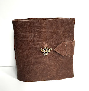 https://www.etsy.com/listing/245409554/brown-leather-mini-journal-with-bee?ref=listing-shop-header-1