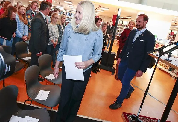 Crown Princess Mette-Marit wore ULLA JOHNSON Wes bow-embellished denim blouse. Crown Prince Haakon