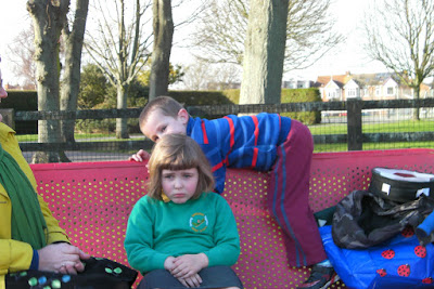 sad child on park bench
