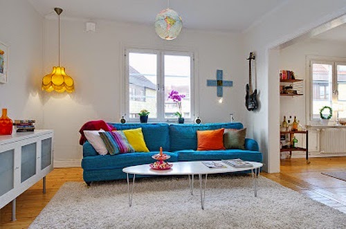 Beautiful White Room with Blue Sofa with White Dining