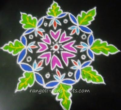 a different kolam with petals and leaves kolam-designs-for-Margazhi-2014-c.jpg