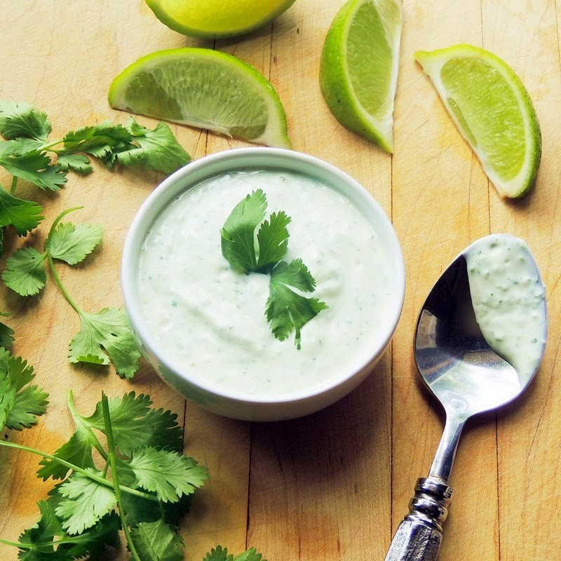 This tasty cilantro lime crema recipe is easy to make, keto friendly, and works so well with everything from tacos, to burritos, to enchiladas, and more! #keto #Lowcarb #crema #sauce #cilantro #lime #Mexican #easy #recipe | bobbiskozykitchen.com