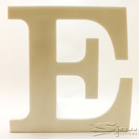 A serif style font flat cut acrylic letter in white
