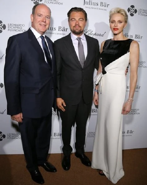 Princess Charlene of Monaco, Prince Albert II of Monaco and Milutin Gatsby arrive at a cocktail during The Leonardo DiCaprio Foundation 3rd Annual Saint-Tropez Gala at Domaine Bertaud Belieu on July 20, 2016 in Saint-Tropez, France.