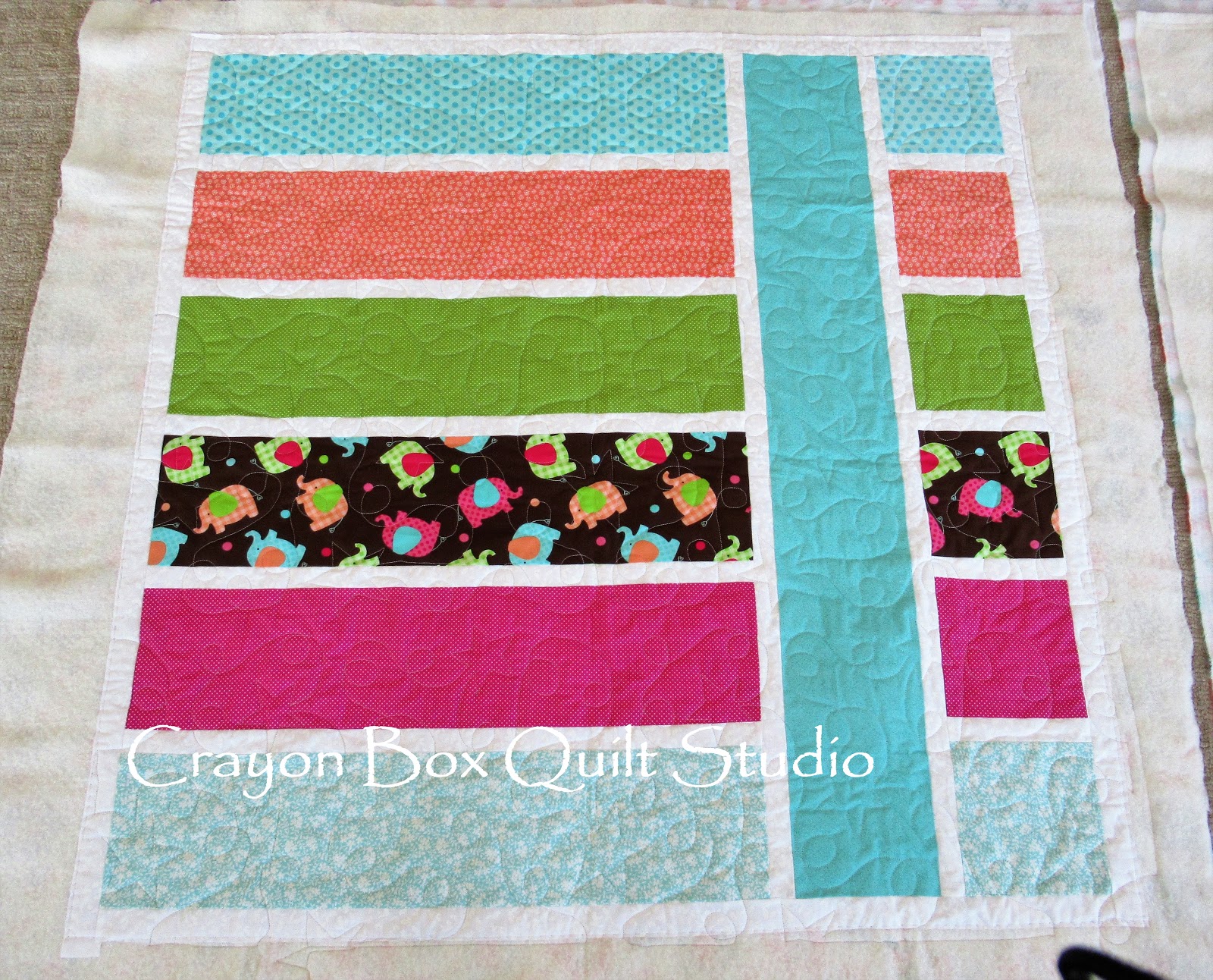 Crayon Box Quilt Studio Charmine's baby quilts x 3