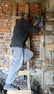 Trying to secure the cement chute Trying to secure the cement chute