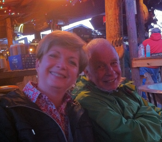 On Being a Tourist: smiling at Captain Stan's Smokehouse in Georgia, 2014 woman and man in restaurant, smiling
