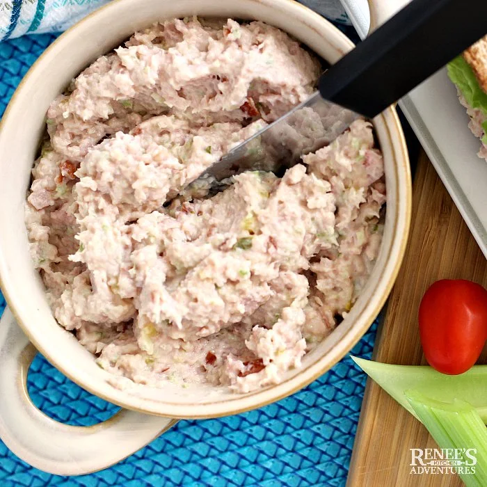 Favorite Ham Salad Recipe by Renee's Kitchen Adventures in a bowl with a spreader overhead view