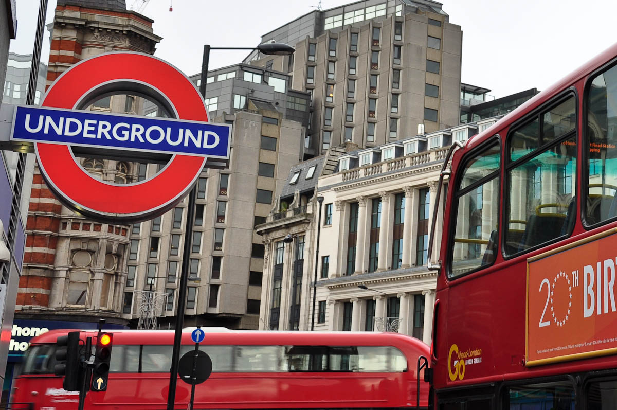 Double-decker busses with the London Underground logo, London, England