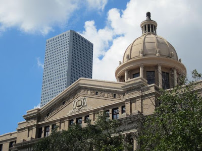 Photo of old Harris County Courthouse with JPMorgan Chase Tower in background