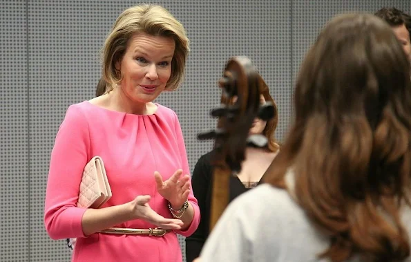 Queen Mathilde of Belgium visits the Higher Institute of Music and Pedagogy in Namur. Wedding dress, fashion weeks, jewelery