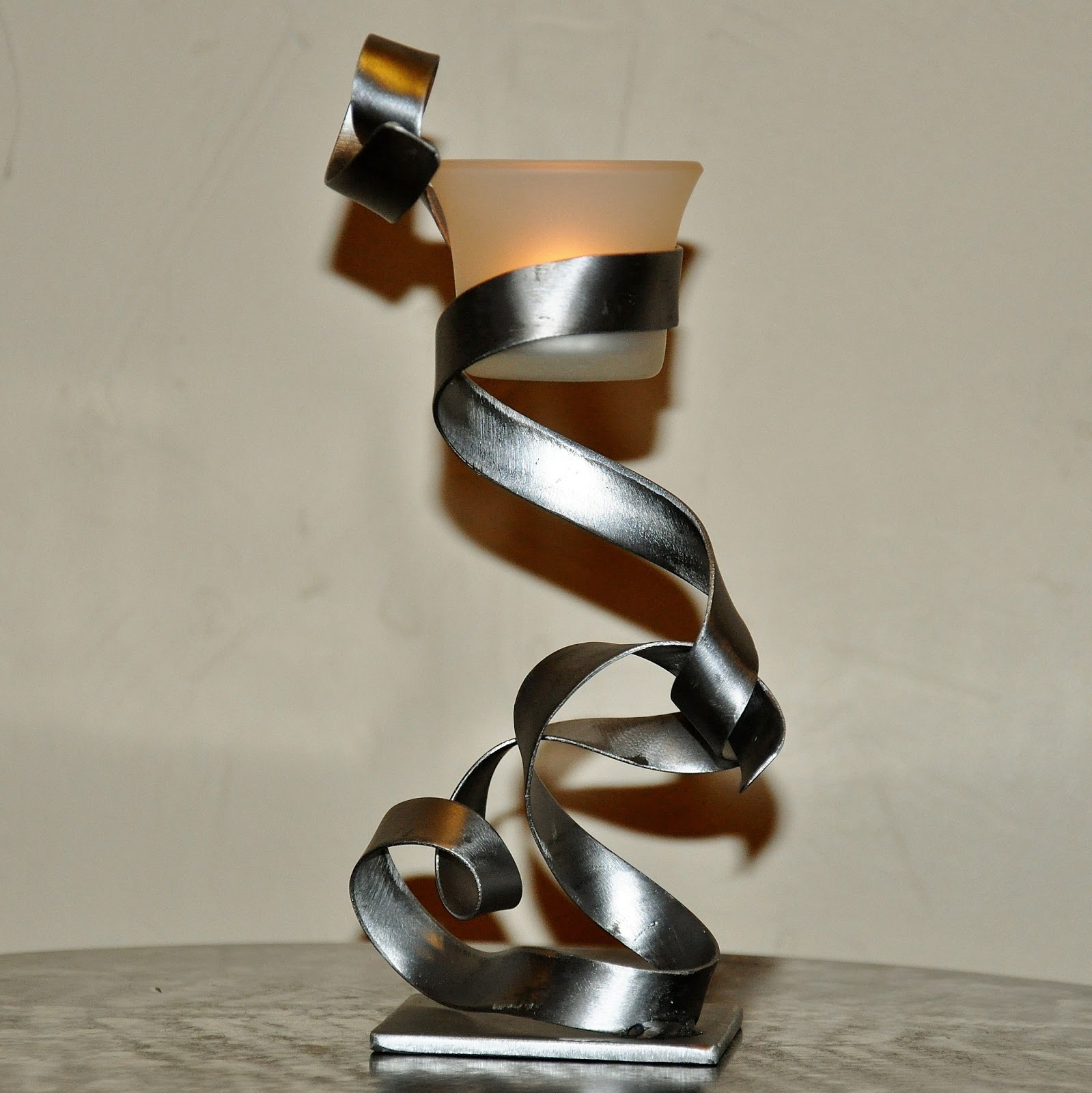 créateur d'objets déco en fer bougeoirs, luminaires