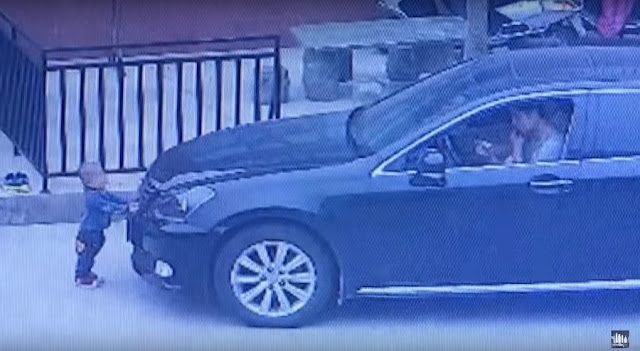 This 2-Year-Old Baby Was Run Over by A Driver Who's Talking on His Phone but The Baby Miraculously Survived! This 2-Year-Old Baby Was Run Over by A Driver Who's Talking on His Phone but The Baby Miraculously Survived!