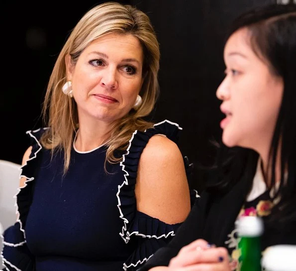 Queen Maxima wore Oscar De La Renta Cold-shoulder ruffled wool midi dress. President Joko Widodo, Kalimantan and Sumatra