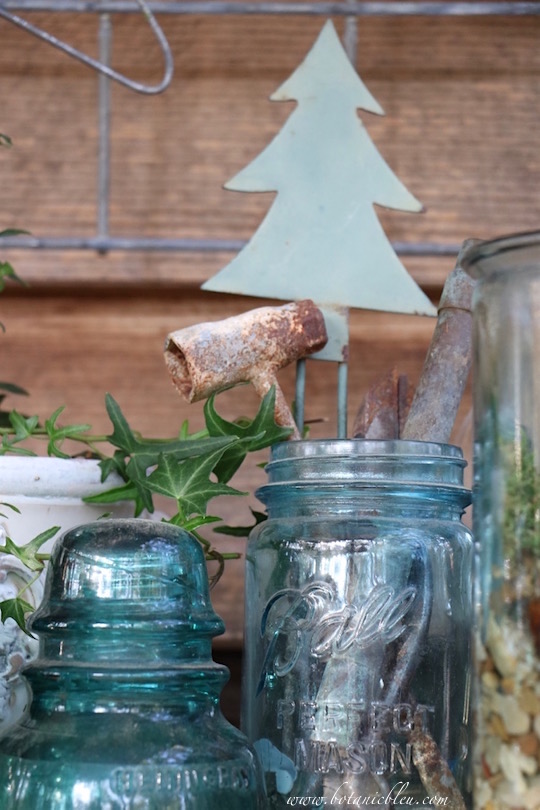vintage-canning-jars-electric-insulators-tools-christmas-potting-bench