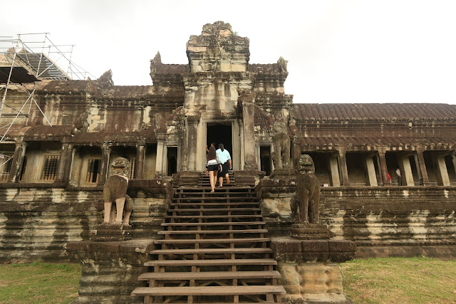 Two Khmer Lion Guardians in stone are placed at the entrance of Angkor Wat Temple in Siem Reap, Cambodia Two Khmer Lion Guardians in stone are placed at the entrance of Angkor Wat Temple in Siem Reap, Cambodia