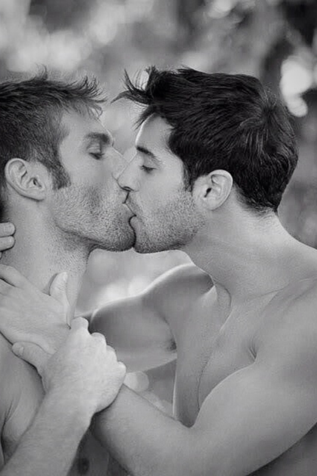 Loving, lusty, and naked: stunning images of gay men kissing