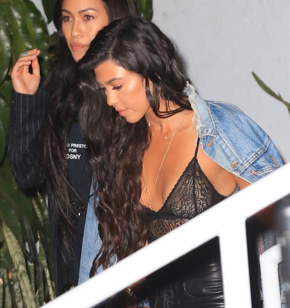 Kourtney Kardashian shows off nipples in lingerie top and sexy leather to w...