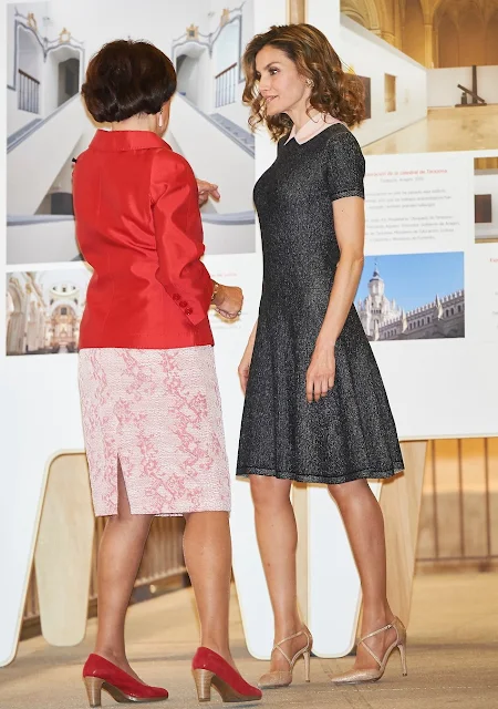 Queen Letizia attends opening of the exhibition the Recognizing the Spanish Heritage in Europe at the COAM in Madrid. Queen letizia wears Magrit shoes, Felipe Varela dress and clutch bag