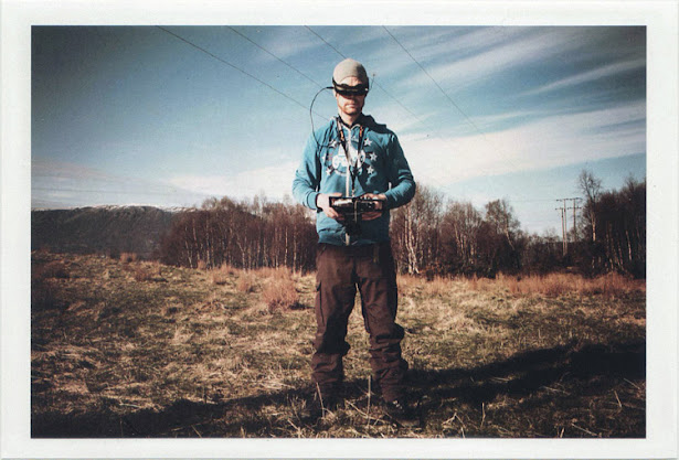 dirty photos - Once - street photo of strange man with 3d glasses guiding aeroplane