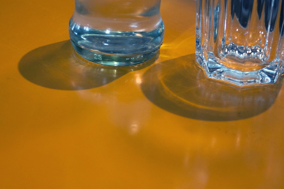 yellow table with glasses