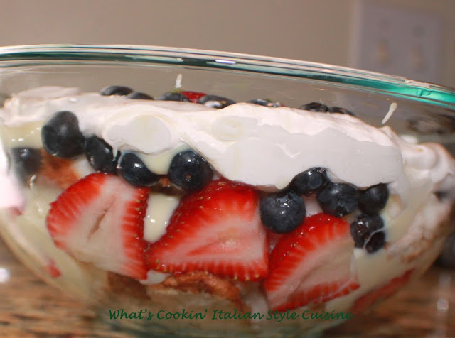 Patriotic Trifle with Blueberries Strawberries and Cream Recipe This is a festive 4th of July trifle with vanilla pudding, strawberries, blueberries, pound cake and cream in a clear bowl