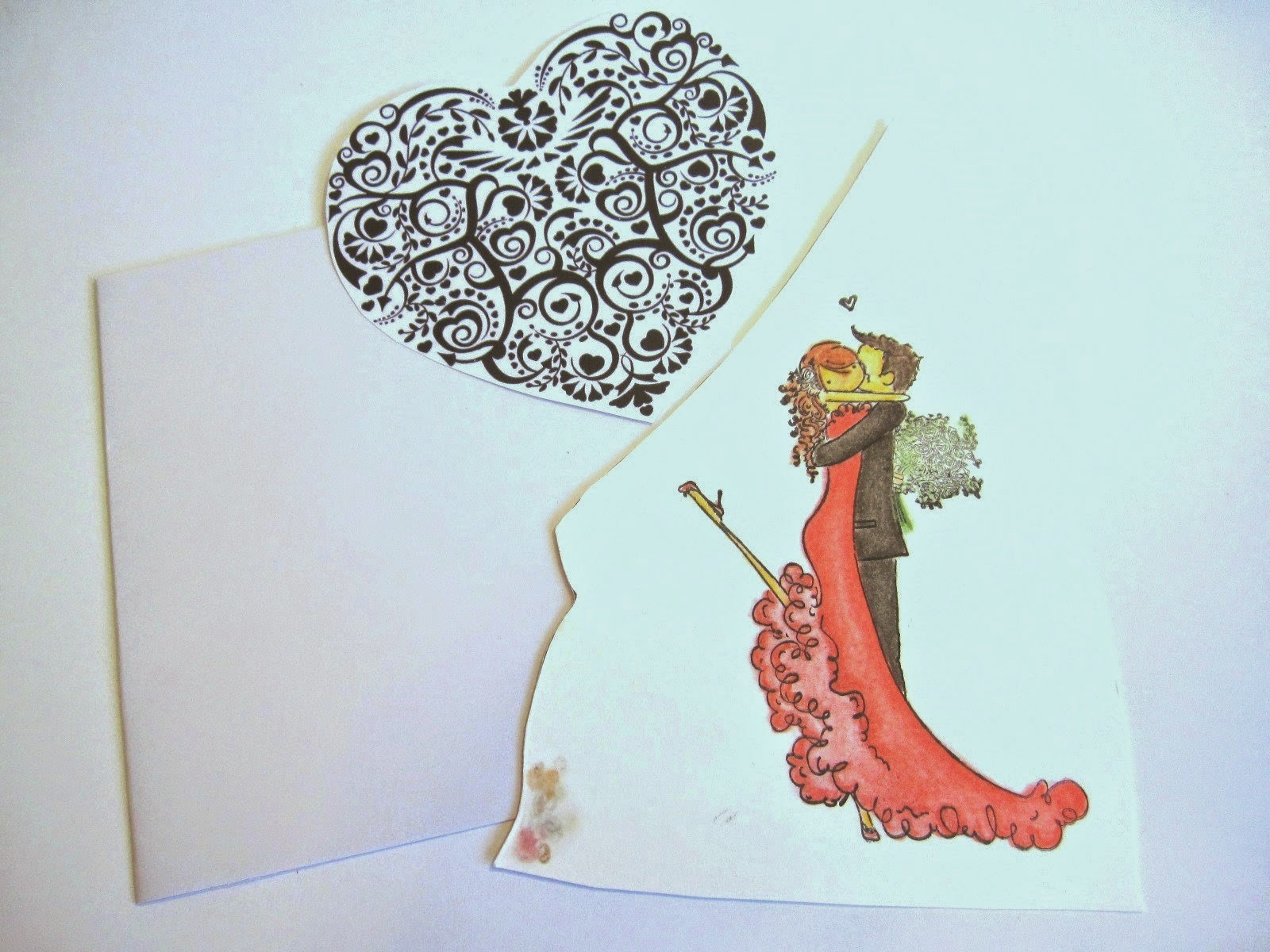  tarjeta blanca, dibujo de corazón negro de filigrana e imagen coloreada de pareja de novios besándose de Stamping Bella