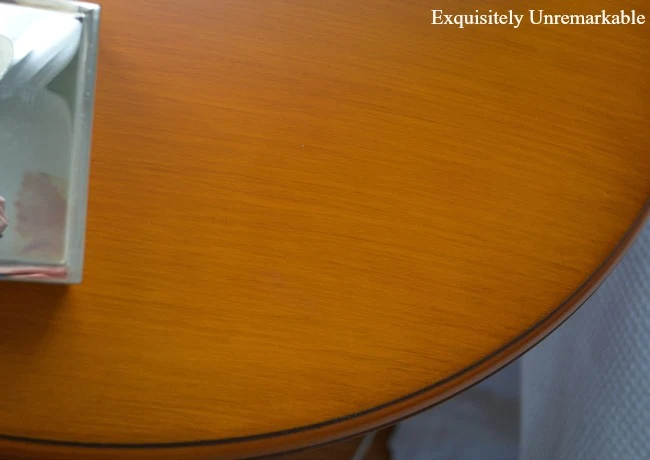 Round wooden table with no water stains