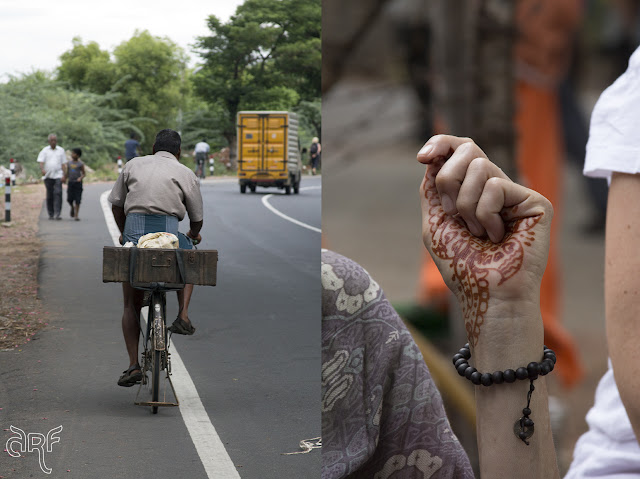 Indian man on bicycle and henna hand