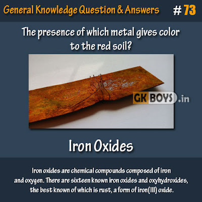 The presence of which metal gives color to the red soil?