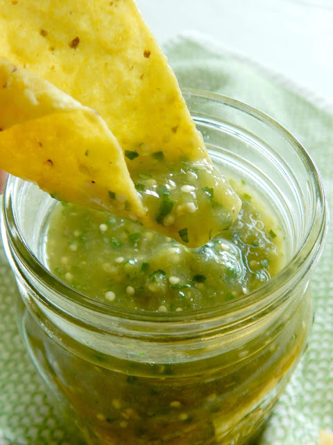 Roasted Green Blender Salsa....jarred tomatillos, onions, jalapenos, cilantro, lime juice, salt and cumin, that's it! This addictiong salsa will become a new family favorite - tangy and sour with just a bit of heat! (sweetandsavoryfood.com)