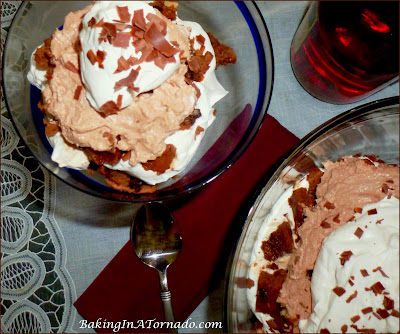 Biscotti Tiramisu Trifle, coffee soaked biscotti, spiked filling and flavored whipped cream come together to create this decadent dessert | Recipe developed by www.BakingInATornado.com | #recipe #dessert 