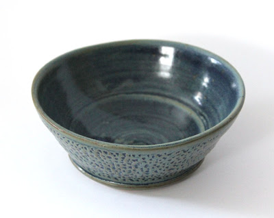 carved and glazed pottery bowl