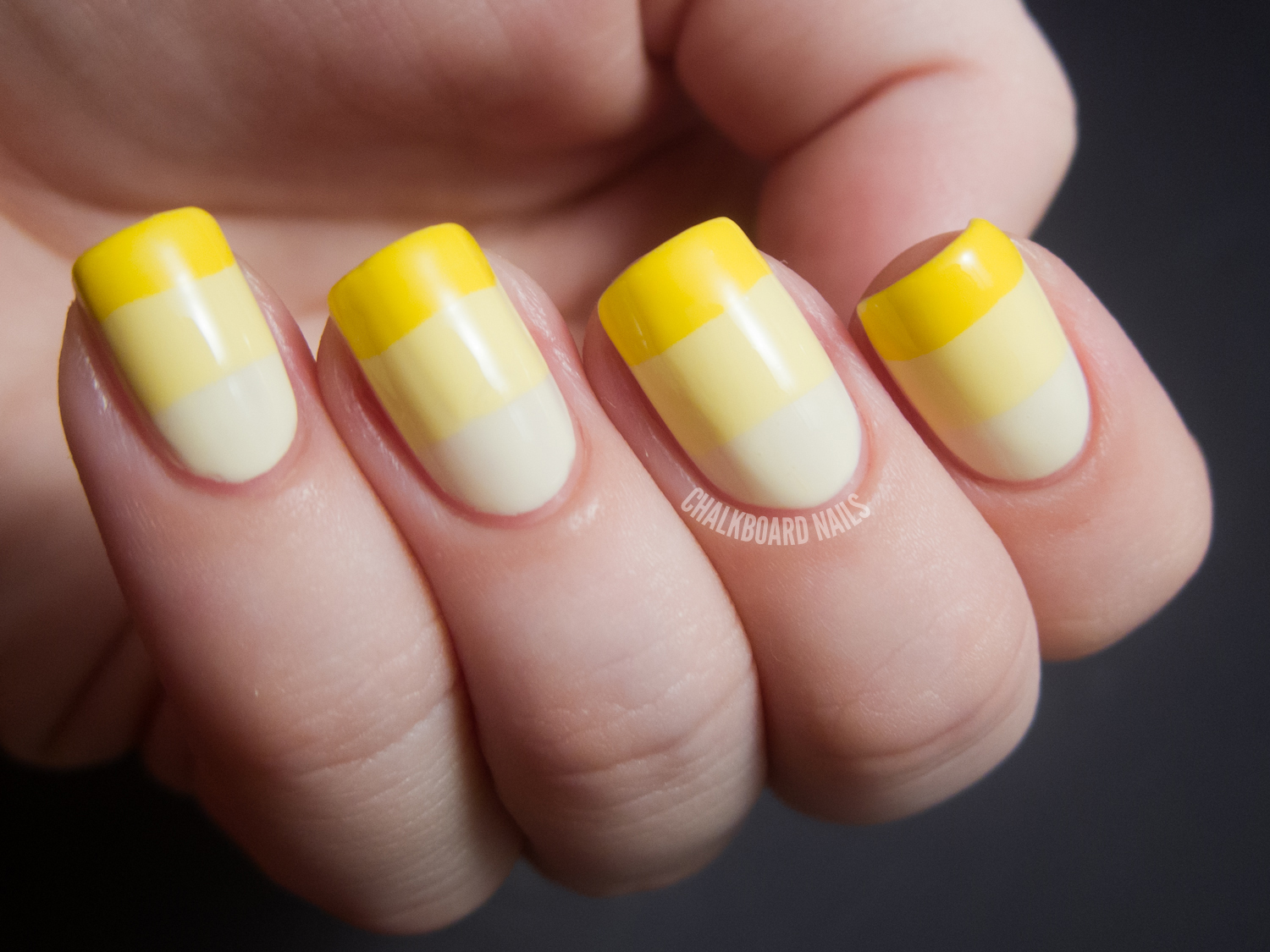 yellow and grey nail design