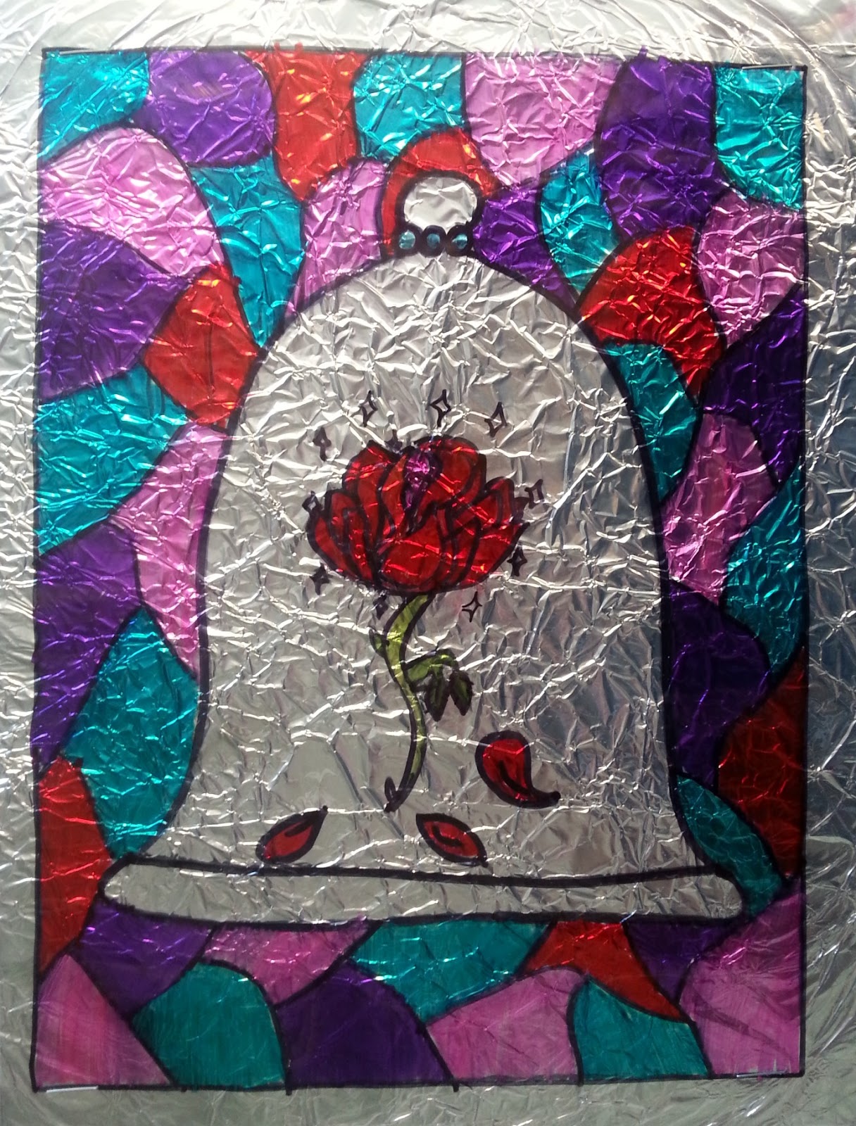 a faithful attempt Faux Stained Glass using Aluminum Foil and Sharpies