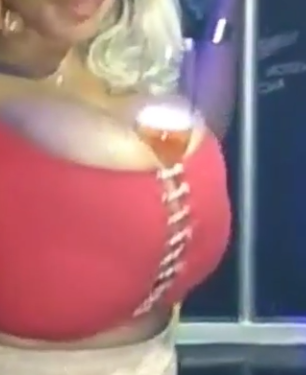 Magical! Cossy Orjiakor Uses Her Boobs To Hold A Wine Glass