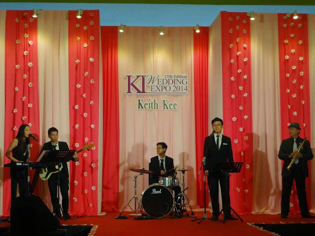 performers in black formal wear suit